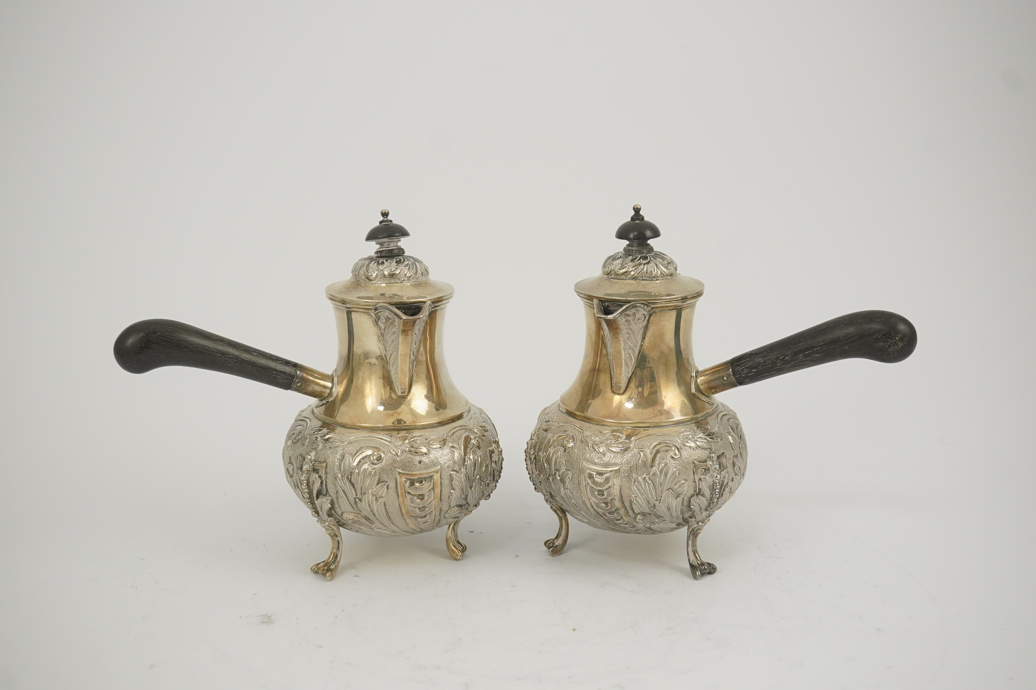 A pair of George V silver chocolate pots, by Goldsmiths & Silversmiths Co Ltd